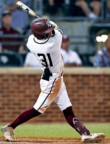 Texas A&M outfielder Jordan Thompson hits a 2-run home run against Louisville in the super regional. Thompson responded with the Aggies down 8-0 to Oklahoma in the bottom of the second with a 3-run shot into the A&M bullpen in Game 1 of the College World Series.